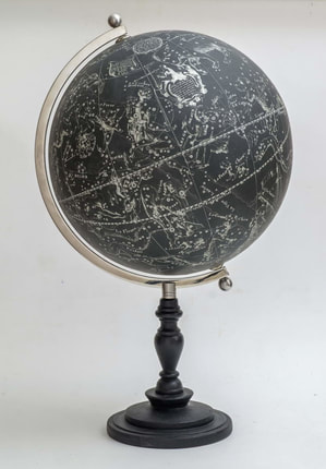 black celestial facsimile globe, black with ivory starsry