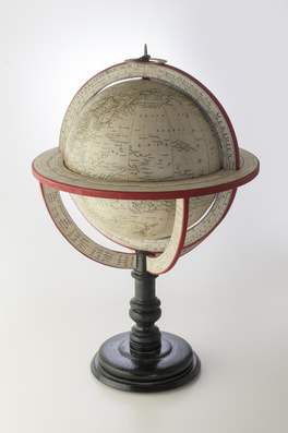 cut out of small globe from Lander and May globe makers