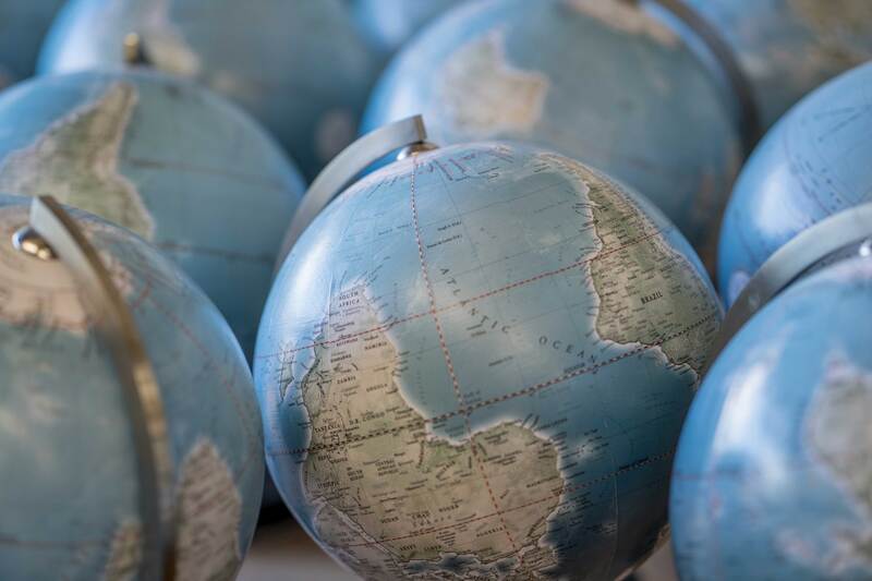 a group of 10 inch diameter upside down globes. the globe is upside down so you can see the bottom