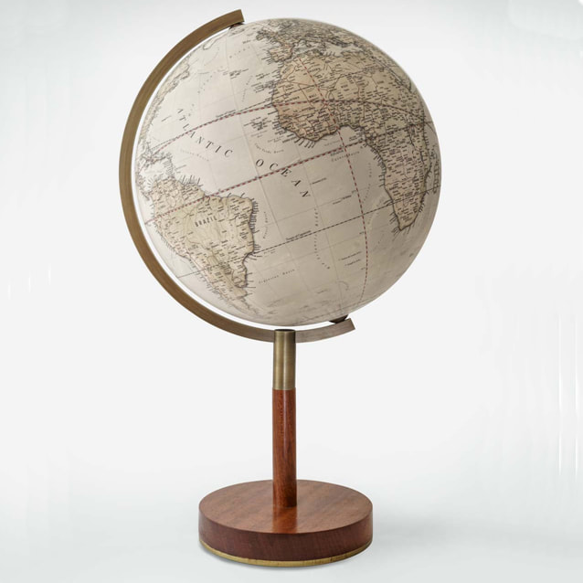 elegant dark wooden stand with slim stem and a timeless globe