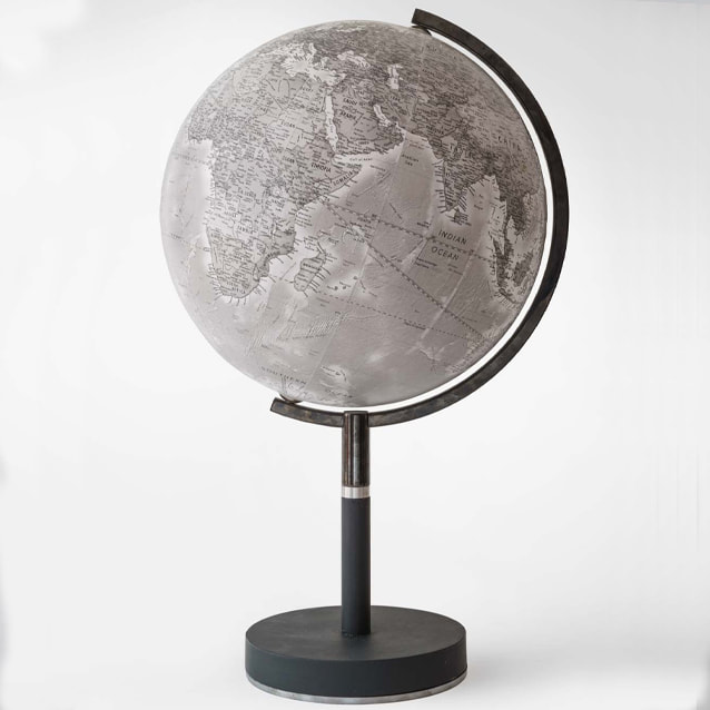 a 13 inch diameter greyscale globe, presented on a black base and black chrome arm