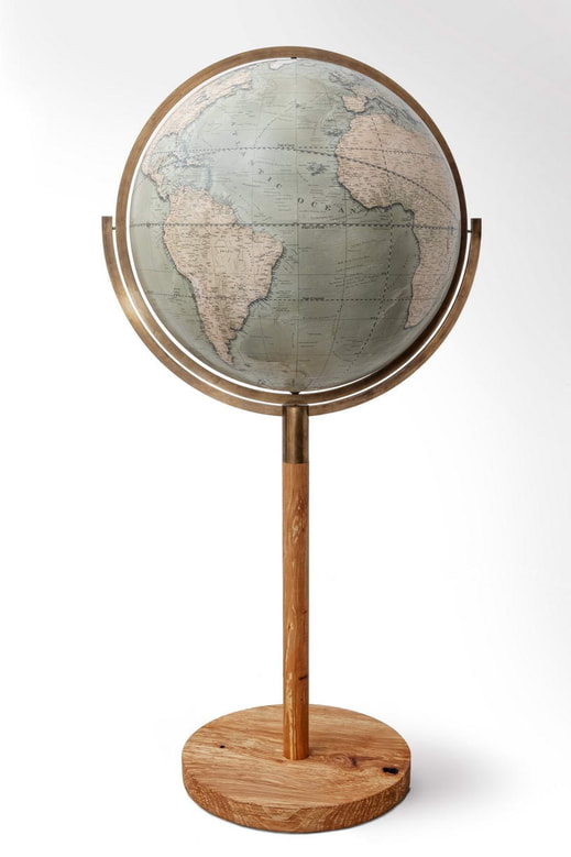 large globe that spins 360 degrees. Stand made from beech and brass