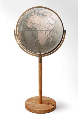 globe spinning 360 degrees with Africa facing. 24inch diameter floor standing globe.