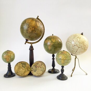6 globes  being restored by Lander and May globe makers 