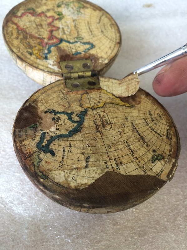 repaired globe, globe restoration
