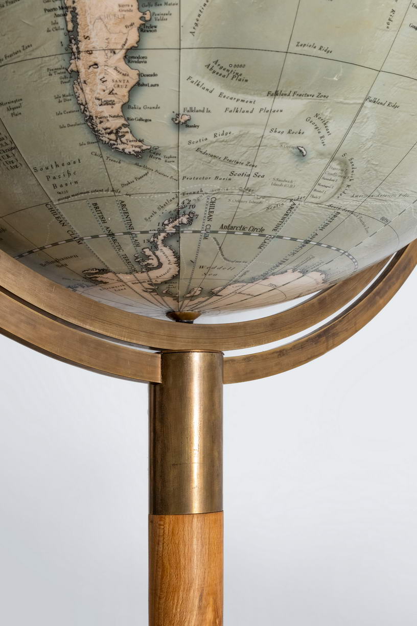 Lander and May 360 degree globe that can rotate and show the South Pole. This is a handmade globe.
