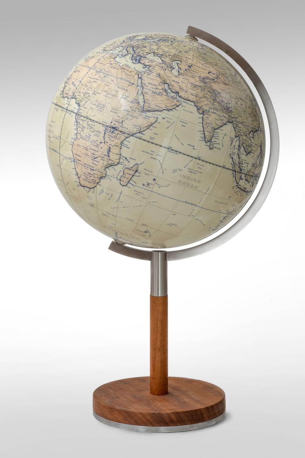 Contemporary stylish globe with brushed steel arm. Showing Indian Ocean on the globe.