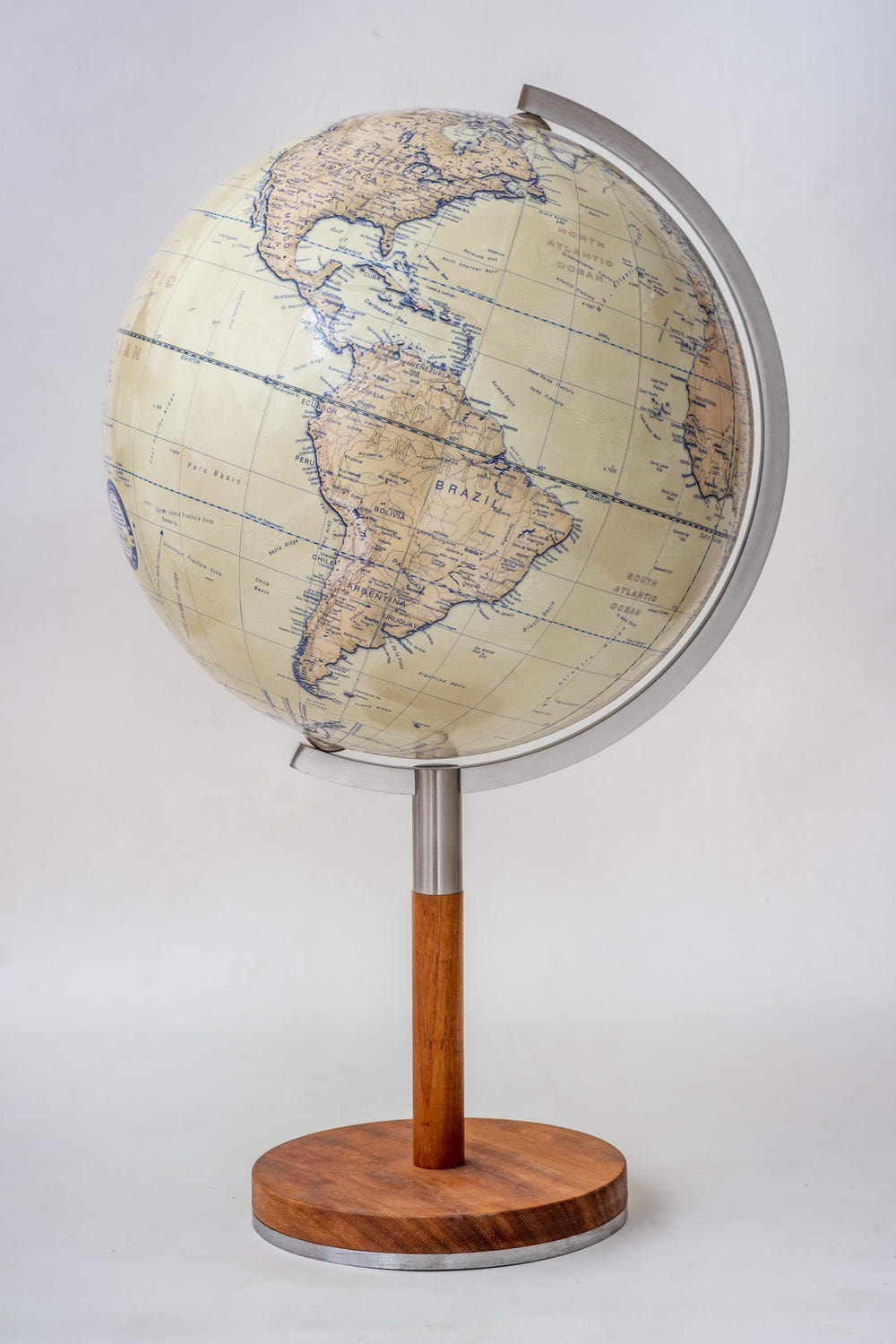 Lander and May Nordic globe with stylish contemporary wood stand . globe shows Brazil
