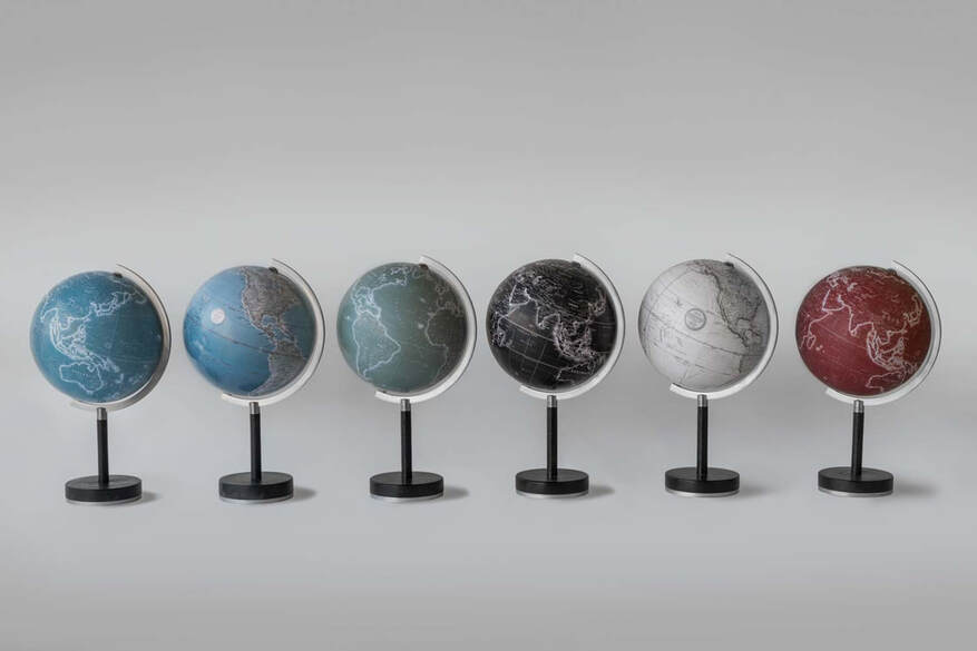6 globes in a line with 6 colours, sitting on a black stand and silver arm