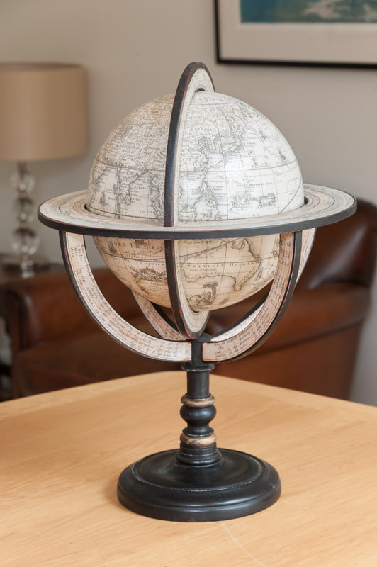 lander and may globe, black. globe base with gold leaf, Desnos table globe