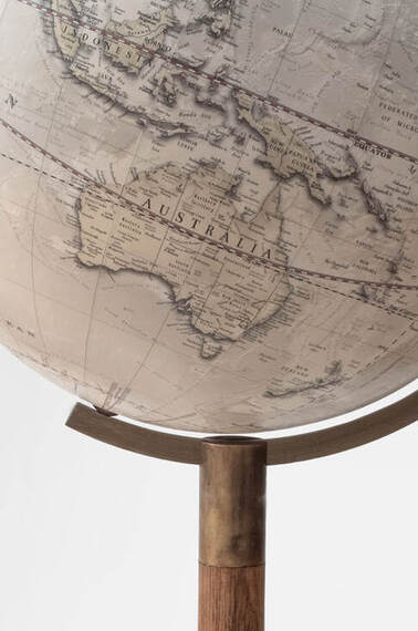 large globe, modern contemporary globe that looks old with a brass stem and wood base