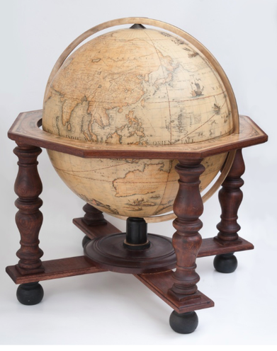 coronelli globe with brass Meridien ring and mahogany base and printed horizon ring